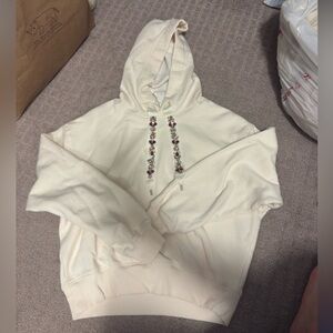 Express Cream Hoodie with Floral Embellishments